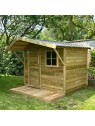 abri de jardin en bois avec porte et fenêtre et avancée de toiture